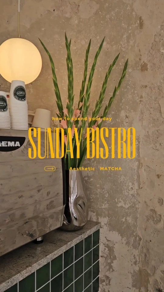 A matcha drink held in one hand